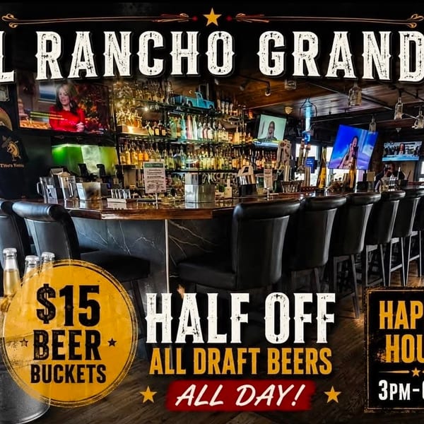 El Rancho Grande bar interior with leather stools, liquor shelves, televisions, and promotional signs for beer buckets and happy hour.